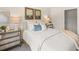 Bedroom with neutral colors, decorative wall art, and ample natural light at 1337 Magnolia Bend Way # 289, Jonesboro, GA 30238