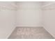 Walk-in closet featuring wire shelving and ample storage space for organization at 1337 Magnolia Bend Way # 289, Jonesboro, GA 30238