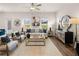 Bright living room showcasing hardwood floors and plenty of natural light through large windows at 1337 Magnolia Bend Way # 289, Jonesboro, GA 30238