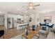 Open concept living room with modern furnishings, stainless steel kitchen appliances and dining area at 1337 Magnolia Bend Way # 289, Jonesboro, GA 30238