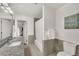 Modern bathroom featuring granite countertops, sleek fixtures, and a tiled shower at 1420 Cortez Ne Ln, Atlanta, GA 30319