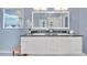 Elegant bathroom with double vanity, white cabinetry, and modern fixtures at 1420 Cortez Ne Ln, Atlanta, GA 30319