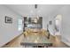 Dining room with seating for 10, hardwood floors, and built-in shelves at 1420 Cortez Ne Ln, Atlanta, GA 30319