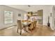 A stylish dining room featuring ample seating, modern lighting, and a seamless design at 1420 Cortez Ne Ln, Atlanta, GA 30319