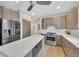 Modern kitchen featuring stainless steel appliances, large kitchen island with white countertop at 1420 Cortez Ne Ln, Atlanta, GA 30319