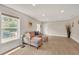 Cozy living room with hardwood floors, a comfortable sofa, and natural light at 1420 Cortez Ne Ln, Atlanta, GA 30319