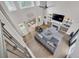 An impressive two-story living room with large windows, modern furnishings, and bright atmosphere at 1420 Cortez Ne Ln, Atlanta, GA 30319