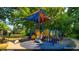 Colorful toddler playground with sunshade, ladders, slides, and other play structures for young children at 1420 Cortez Ne Ln, Atlanta, GA 30319