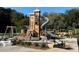 Community playground featuring climbing structures, swings, and slides at 1420 Cortez Ne Ln, Atlanta, GA 30319