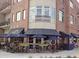 Building with outdoor restaurant seating and blue awnings at 1420 Cortez Ne Ln, Atlanta, GA 30319