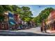 Charming street view with colorful buildings, awnings, and tree-lined sidewalks, perfect for strolling at 1420 Cortez Ne Ln, Atlanta, GA 30319