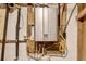 Efficient tankless water heater providing on-demand hot water, installed with visible plumbing and electrical connections at 2167 Tanglewood Rd, Decatur, GA 30033