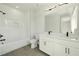Bright bathroom with double vanity, modern fixtures, and separate tub and shower at 2202 Carlton Ct # 7, Atlanta, GA 30318