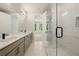 Bright bathroom with double vanity, walk-in shower, and marble floors for a luxurious feel at 2202 Carlton Ct # 7, Atlanta, GA 30318