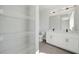Bright bathroom featuring a double vanity, modern fixtures, and shelving at 2202 Carlton Ct # 7, Atlanta, GA 30318