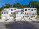 Contemporary townhome exteriors featuring private balconies, garages, and modern white brick and siding at 2202 Carlton Ct # 7, Atlanta, GA 30318