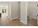 Entry hall featuring LVP floors, leading to a bathroom and living room at 2202 Carlton Ct # 7, Atlanta, GA 30318