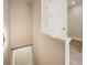 Neutral hallway with white trim details, leading to the unfinished basement area at 2202 Carlton Ct # 7, Atlanta, GA 30318