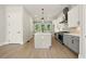 Spacious kitchen with gray island, pendant lighting, stainless steel appliances, and modern finishes at 2202 Carlton Ct # 7, Atlanta, GA 30318