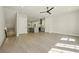 Open-concept living room featuring hardwood floors, recessed lighting, and an open kitchen at 2202 Carlton Ct # 7, Atlanta, GA 30318