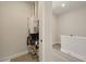 Utility room featuring modern HVAC system with tile floors at 2202 Carlton Ct # 7, Atlanta, GA 30318