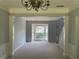 Inviting dining room featuring large windows, carpeted floors, and light gray walls at 3118 Stanstead Ct, Norcross, GA 30071