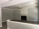 Cozy living room with a fireplace, hardwood floors, and neutral paint at 3118 Stanstead Ct, Norcross, GA 30071