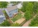 Aerial view of fenced backyard with lawn, playset, and deck at 1095 Lyndhurst Way, Roswell, GA 30075