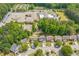 Aerial view of a neighborhood and surrounding trees at 1095 Lyndhurst Way, Roswell, GA 30075