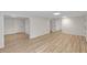 Finished basement space with modern flooring and recessed lighting at 1095 Lyndhurst Way, Roswell, GA 30075