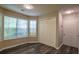 Well-lit bedroom with a spacious closet and ample natural light at 1930 Rocky Mill Ln, Lawrenceville, GA 30044