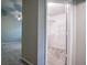Walk-in closet features ample storage space with built-in shelving units at 1930 Rocky Mill Ln, Lawrenceville, GA 30044