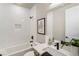 Bright bathroom boasts a tiled shower-tub, modern fixtures, and stylish vanity with ample counter space at 2144 Tidwell Ln # 2, Atlanta, GA 30318