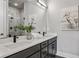 Modern bathroom features double sinks, large mirror and a marble shower at 2144 Tidwell Ln # 2, Atlanta, GA 30318