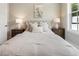 Inviting bedroom with soft lighting, comfortable bedding, and elegant decor for a restful retreat at 2144 Tidwell Ln # 2, Atlanta, GA 30318