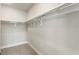 Spacious walk-in closet features upper and lower shelving for storage at 2144 Tidwell Ln # 2, Atlanta, GA 30318
