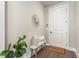 Welcoming entryway features a decorative bench, stylish decor, and a dark wood floor at 2144 Tidwell Ln # 2, Atlanta, GA 30318