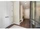 Inviting entryway featuring hardwood floors, staircase, and a view into the next room at 2144 Tidwell Ln # 2, Atlanta, GA 30318