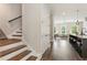 Bright, open floor plan with stairs, modern kitchen, and inviting living room; seamless connectivity at 2144 Tidwell Ln # 2, Atlanta, GA 30318