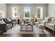 Comfortable living room featuring hardwood floors, natural light, and stylish neutral decor at 2144 Tidwell Ln # 2, Atlanta, GA 30318