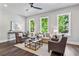 Bright living room features dark wood floors and lots of natural light at 2144 Tidwell Ln # 2, Atlanta, GA 30318
