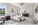 Bright primary bedroom with large windows and sitting area at 2144 Tidwell Ln # 2, Atlanta, GA 30318