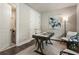 Bright office space with modern desk, neutral decor, and a glimpse of an adjoining bathroom at 2144 Tidwell Ln # 2, Atlanta, GA 30318