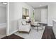 Sitting area with chairs, rug, and a glass coffee table at 2144 Tidwell Ln # 2, Atlanta, GA 30318