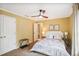 Inviting bedroom with natural light featuring fresh carpet and ceiling fan at 7249 Village Creek Trce, Atlanta, GA 30328