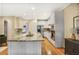 Bright, all-white kitchen featuring granite countertops, stainless steel appliances, and ample cabinet space at 7249 Village Creek Trce, Atlanta, GA 30328