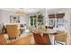 Bright living room with hardwood floors and large windows at 7249 Village Creek Trce, Atlanta, GA 30328