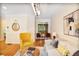 Cozy living room with hardwood floors, stylish seating, and natural light, creating a comfortable atmosphere at 7249 Village Creek Trce, Atlanta, GA 30328