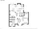 Floorplan of the main level featuring a spacious living room, dining room, Gathering room, kitchen, foyer and bathroom at 7249 Village Creek Trce, Atlanta, GA 30328