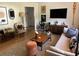 Comfortable living space with a sofa, armchairs, wooden accents, and stylish decor at 1038 Ralph Ne Rd, Atlanta, GA 30324
